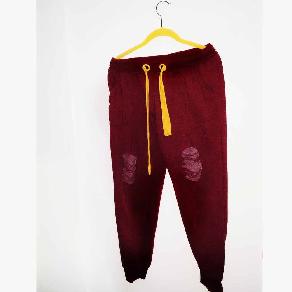 Maroon Joggers with yellow string. Extremely comfy